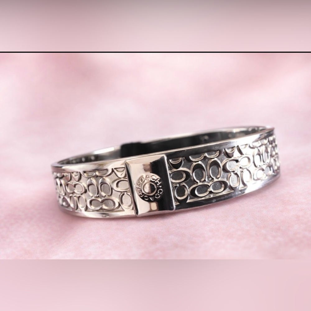 Quiet Luxury Silver Tone Cuff Bracelet with Intricate “C” Design - Picture 5 of 6
